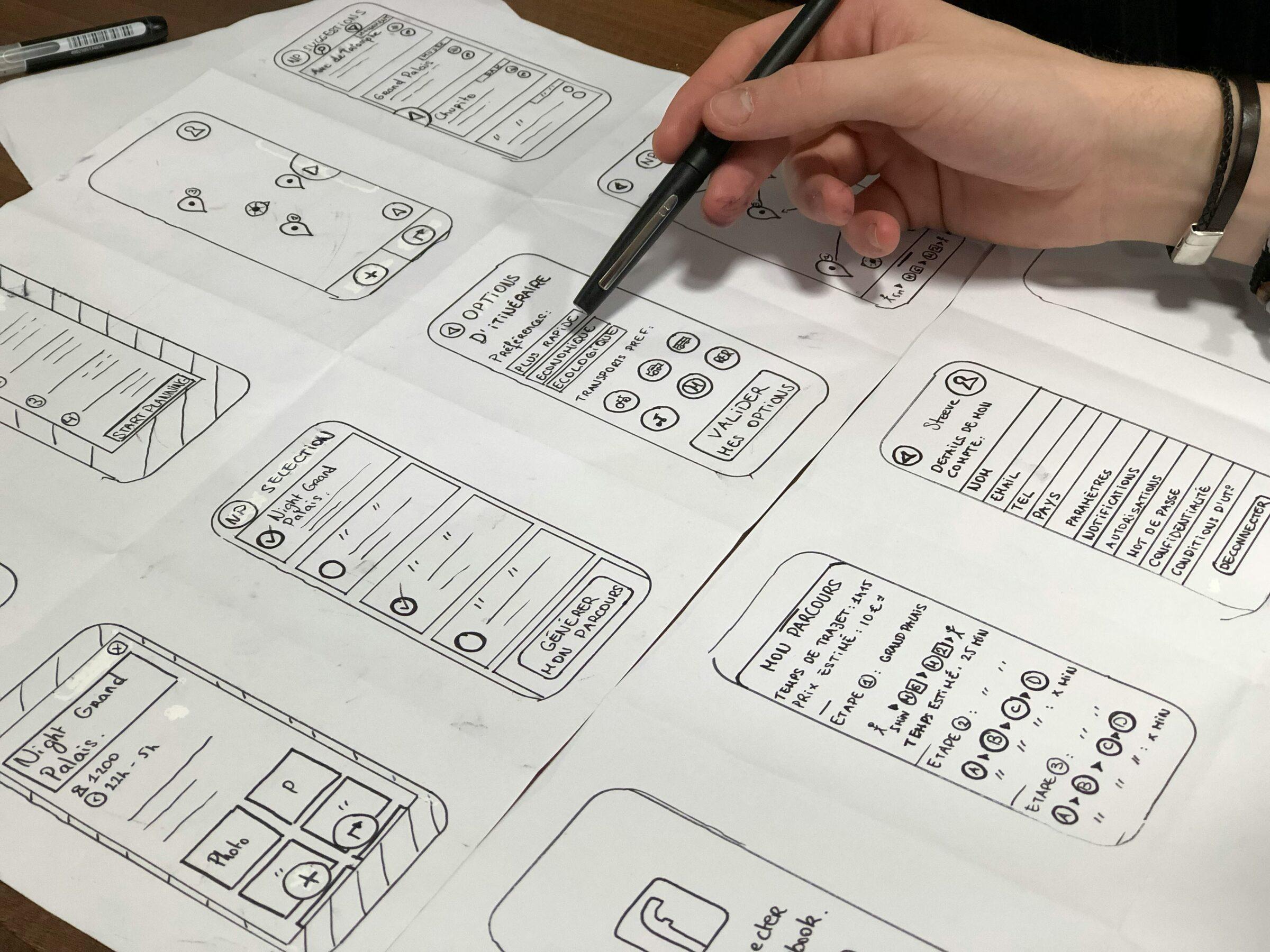 Hand-drawn wireframe sketches of a mobile app interface